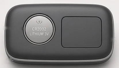 Back of the LumiFob case with the tool-free CR2032 twist door and tracker pocket